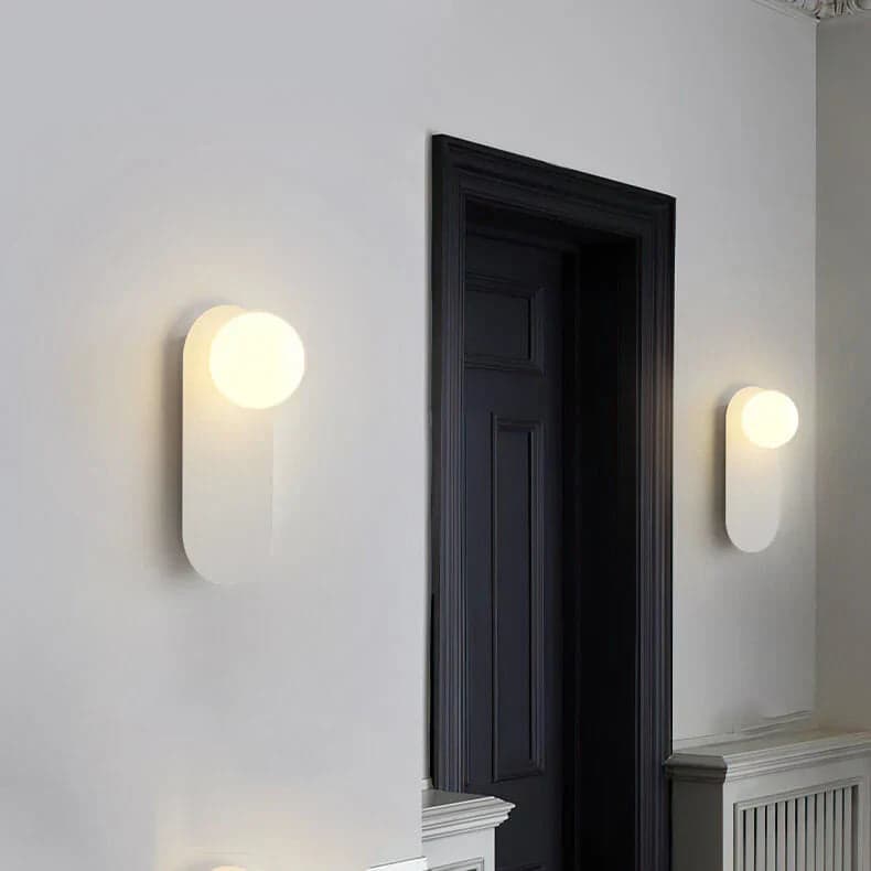 Minimalistyczna kinkietowa lampa ścienna z okrągłą szklaną podstawą 2